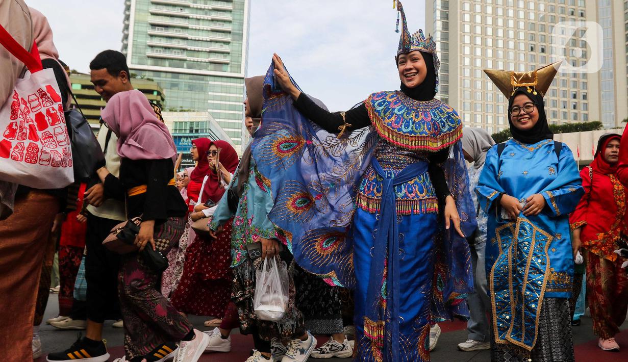 Mereka berpawai untuk merayakan masa lalu dan menyuarakan masa depan. (Liputan6.com/Herman Zakharia)