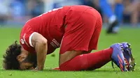 Striker Liverpool Mohamed Salah melakukan sujud syukur usai mencetak gol ke gawang Brighton pada pekan ke-8 Liga Inggris (AFP)