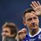 John Terry. Bek tengah yang menjadi legenda di Chelsea ini total bermain dalam 19 musim, mulai 1998/1999 hingga 2016/2017 dengan total tampil sebanyak 717 laga dengan torehan 67 gol. Ia pensiun pada 2018 bersama Aston Villa yang tengah berlaga di Championship. (Foto: AFP/Ben Stansall)
