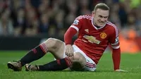 Namun sayang tidak ada perayaan pada laga istimewa Rooney karena Setan Merah takluk di kandang sendiri dari Norwich 1-2. (AFP/Oli Scarff)