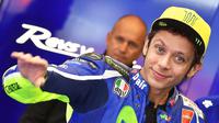 Pebalap Yamaha, Valentino Rossi, menghadapi balapan MotoGP Catalunya, akhir pekan ini, dengan perasaan campur aduk. (EPA/Ettore Ferrari)