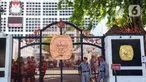 Polisi dan petugas keamanan berjaga di sekitar area Gedung Komisi Pemilihan Umum (KPU) Republik Indonesia, Jakarta, Selasa (19/3/2024). (Liputan6.com/Angga Yuniar)