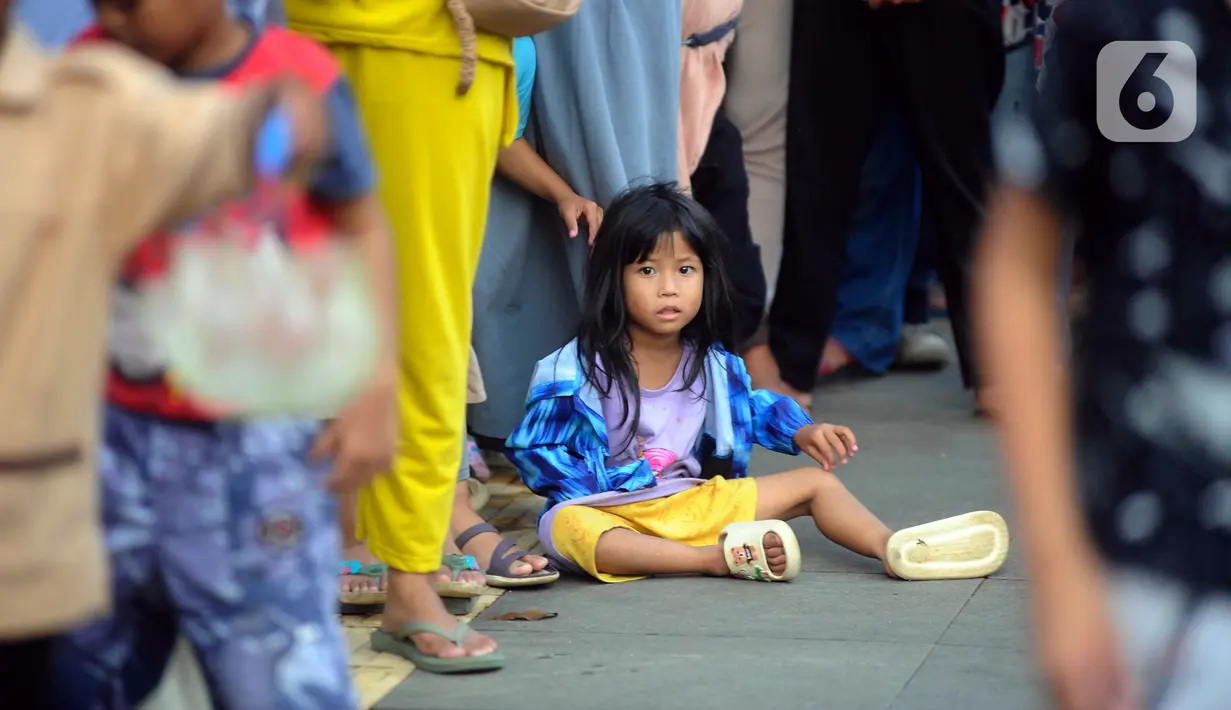 Kegiatan berbagi takjil gratis ini juga membuka peluang bagi masyarakat kurang mampu untuk dapat berbuka puasa dengan layak. (merdeka.com/Arie Basuki)
