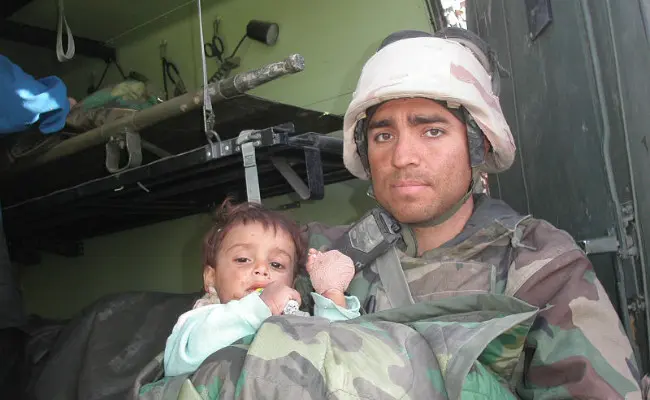 Ilustrasi anak kecil dalam Perang Irak. (Sumber Wikimedia Commons/Cpl. Jordan Johnson)