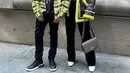 Isyana Sarasvati dan Afgan berpose menjelang pertunjukan Coach Spring/Summer 2023 di New York Fashion Week 2022. Isyana tampil kece menggunakan coat berwarna senada dengan kemeja kotak-kotak yang dikenakan Afgan. (Instagram/kanmogroup.fashion)