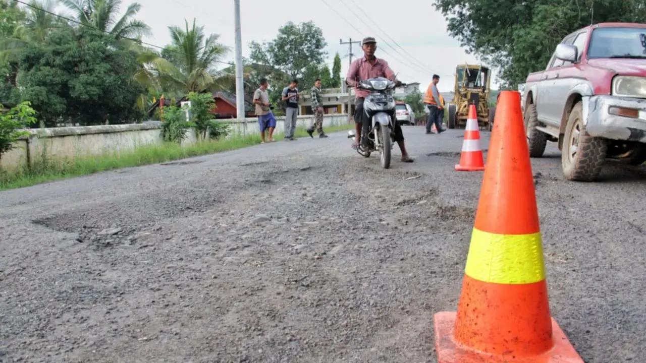 Jalan Poros Trans Batumarta Unit 2, Kecamatan Lubuk Raja, Kabupaten Ogan Komering Ulu (OKU), Sumatera Selatan. (Dok Kementerian PUPR)