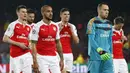 Ekspresi kekecewaan pemain Arsenal usai takluk dari Barcelona pada laga leg kedua babak 16 besar Liga Champions di Stadion Camp Nou, Barcelona, Kamis (16/3/2016) dini hari WIB. (Action Images via Reuters/Carl Recine)