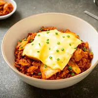 ilustrasi nasi panggang keju/gowithstock/Shutterstock