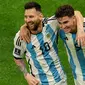 Duet Lionel Messi dan Julian Alvarez berhasil mengantarkan timnas Argentina ke partai final Piala Dunia 2022. (AFP/Adrian Dennis)
