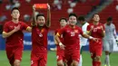 Ekspresi pemain Vietnam U-23, Huy Toan Vo, setelah mencetak gol ke gawang Indonesia U-23. (Bola.com/Arief Bagus)