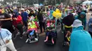 Sejumlah anak penyandang Cerebral Palsy mengikuti kampanye untuk memperingati Hari Cerebral Palsy Sedunia di kawasan Car Free Day, Jakarta, Minggu (13/10/2019). Kegiatan tersebut dilakukan untuk memperingati Hari Cerebral Palsy Sedunia yang jatuh pada tanggal 6 Oktober. (Liputan6.com/Johan Tallo)