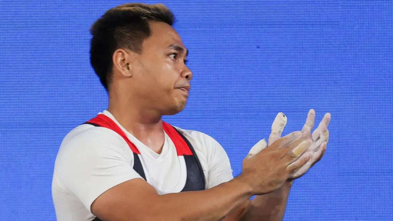 Foto: Ekspresi Eko Yuli Irawan Setelah Gagal Meraih Medali di Asian Games 2022