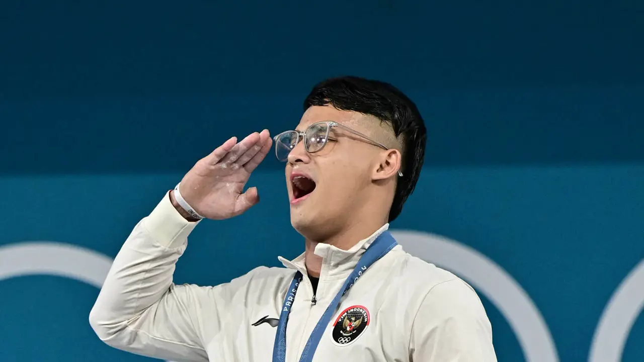 Raih Emas Angkat Besi Olimpiade Paris 2024, Rizki Juniansyah Cetak Sejarah dan Pecahkan Rekor "Clean and Jerk"