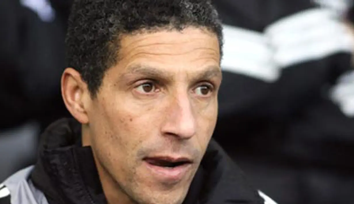 Newcastle United's stand in manager Chris Hughton watches from the bench against West Bromwich Albion during their Premiership football match at The Hawthorns in Birmingham, on February 7, 2009. AFP PHOTO/Chris Ratcliffe
