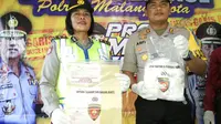 Kapolres Malang Kota, AKBP Asfuri menunjukkan barang bukti narkoba yang disita dari pemakai dan pengedar (Liputan6.com/Zainul Arifin)