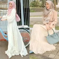 Lihat di sini gaya elegan Larissa Chou dengan hijab syari'i berwarna pastel.
