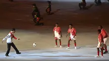 Presiden Joko Widodo (kiri) bermain bola dengan sejumlah pengisi acara saat Upacara Pembukaan PON Papua di Stadion Lukas Enembe, Kompleks Olahraga Kampung Harapan, Distrik Sentani Timur, Kabupaten Jayapura, Papua, Sabtu (2/10/2021). (ANTARA FOTO via InfoPublik/Nova Wahyudi)