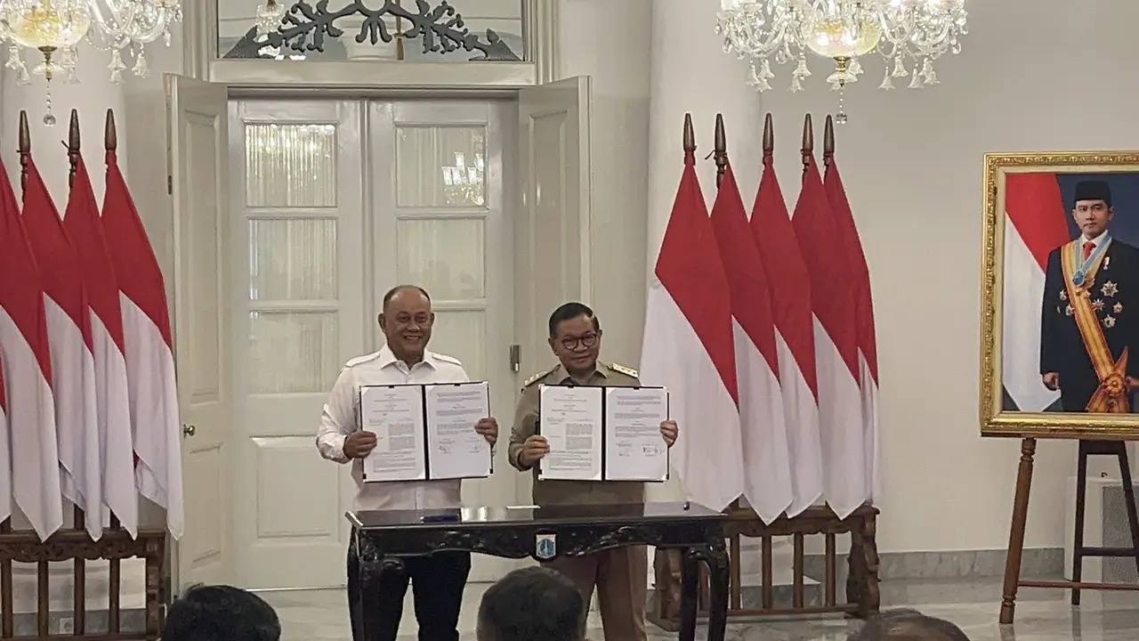 Kepala Badan Gizi Nasional (BGN) Dadan Hindayana dan Gubernur DKI Jakarta Pramono Anung di Balai Kota DKI Jakarta, Senin (9/2/2026) (Liputan6.com/Winda Nelfira)