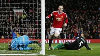 Rooney melakukan selebrasi usai cetak gol ke gawang Stoke (Reuters)