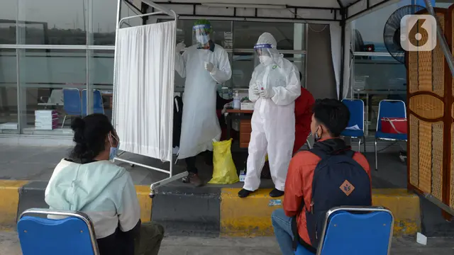 FOTO: Di Terminal Pulogebang, Tiga Orang Terkonfirmasi Positif COVID-19