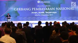 Gubernur BI Agus DW Martowardojo memberi sambutan dalam launching Gerbang Pembayaran Nasional (GPN) di Gedung BI, Jakarta, Senin (4/12). Sistem ini untuk menyatukan berbagai sistem pembayaran milik berbagai bank yang berbeda. (Liputan6.com/Angga Yuniar)
