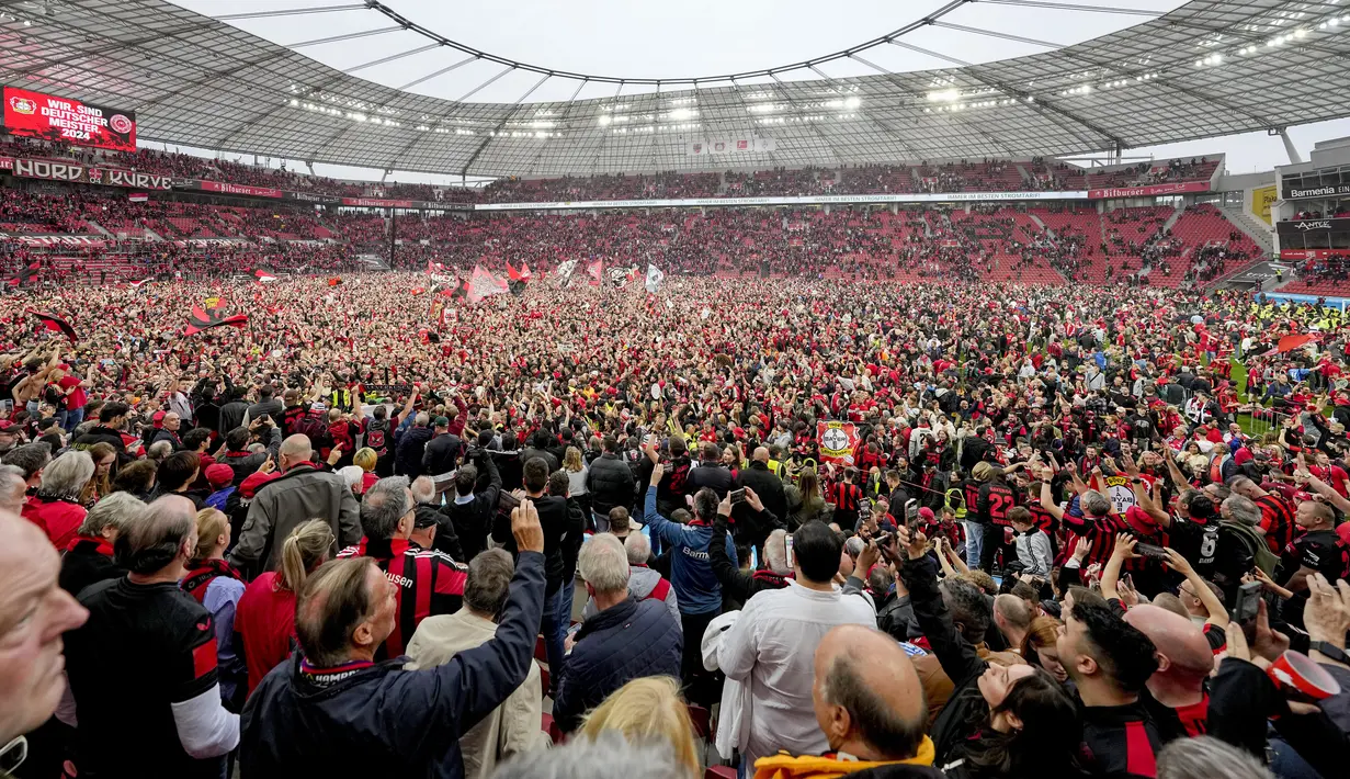 Bagi klub yang dijuluki Die Werkself tersebut, itu adalah titel juara liga perdana sejak klub didirikan pada 1904 atau 119 tahun silam. (AP Photo/Martin Meissner)