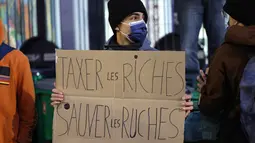 Aksi protes dan pemogokan massal terkait rencana pemerintah memangkas anggaran. (GEOFFROY VAN DER HASSELT/AFP)