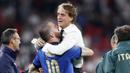 Roberto Mancini - Pelatih berkebangsaan Italia ini sukses membawa negaranya berjaya Piala Eropa edisi tahun 2020. Di partai final, Gli Azzurri menumbangkan tuan rumah Inggris lewat drama adu penalti. (Foto:AP/Carl Recine)