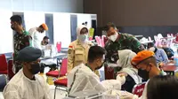 TNI bersama Perwakilan Umat Budha Indonesia (Walubi) kembali menggelar "Serbuan Vaksinasi Dosis Kedua" dengan jenis vaksin Sinovac.