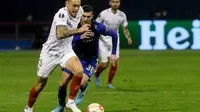 Dynamo Zagreb harus tersingkir dari Europa League 2021/2022 meski menang 1-0 melawan Sevilla di leg kedua babak playoff 16 besar. Dinamo kalah agregat 2-3 dari Sevilla (AFP/Denis Lovrovic)