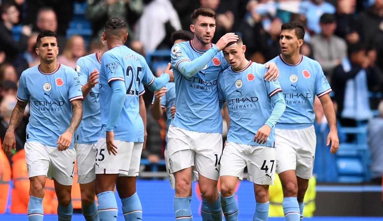 Manchester City. Klub yang dinakhodai Pep Guardiola ini total menyumbang 16 pemain yang akan berlaga di Piala Dunia 2022 Qatar yang didominasi oleh Timnas Inggris sebanyak 5 pemain. Sementara sisanya adalah Portugal (3), Spanyol (2) dan masing-masing satu pemain untuk Swiss, Belgia, Jerman, Belanda, Brasil dan Argentina. (AFP/Oli Scarff)