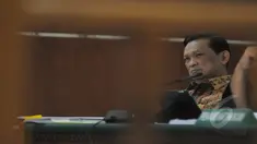 Terdakwa kasus korupsi pengadaan simulator SIM di Korlantas Polri, Brigjen Pol Didik Purnomo  mengikuti sidang lanjutan dengan agenda mendengarkan keterangan saksi di Pengadilan Tipikor Jakarta, Kamis (5/2/2015).  (Liputan6.com/Herman Zakharia)