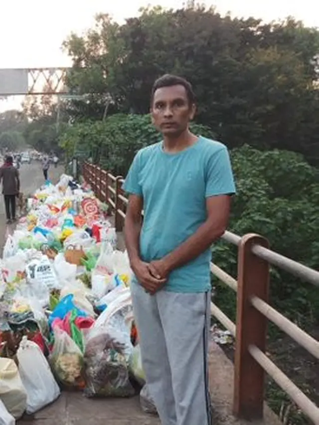 Viral, Kisah Pria Rela Berdiri Seharian Demi Cegah Orang Buang Sampah ke Sungai