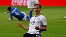 Ekspresi pemain Jerman, Mario Goetze, setelah mencetak gol ke gawang Italia dalam laga persahabatan di Stadion Allianz-Arena, Munchen, Jerman, (29/3/2016). (Reuters/Michaela Rehle)