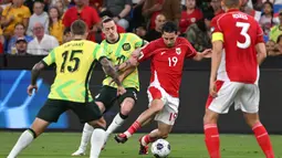 Bermain di Australia, tim racikan pelatih Patrick Kluivert tampil agresif di awal pertandingan. (Saeed KHAN/AFP)
