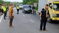 Antisipasi Napi Rutan Siak Kabur, Pintu Masuk ke Pekanbaru Dijaga Ketat Polisi (Foto: Liputan6/ M Syukur)
