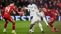 Bermain kandang, The Reds sukses membekuk juara bertahan Liga Champions, Real Madrid dengan skor 2-0. (Oli SCARFF/AFP)
