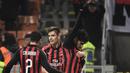 Selebrasi gol Paqueta untuk korban kebakan di akademi sepak bola Flamengo pada laga lanjutan Serie A yang berlangsung di stadion San Siro, Milan, Senin (11/2). AC Milan menang 3-0 atas Cagliari. (AFP/Marco Bertorello)