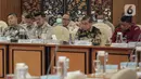 Menteri Pertanian Syahrul Yasin Limpo (kedua kiri) saat rapat kerja dengan Komisi IV DPR RI di Gedung Parlemen, Jakarta, Kamis (19/1/2023). Rapat kerja membahas Daftar Inventarisasi Masalah (DIM) dan pembentukan panitia kerja Rancangan Undang-Undang (RUU) tentang Konservasi Sumber Daya Alam Hayati dan Ekosistem (KSDAHE). (Liputan6.com/Faizal Fanani)