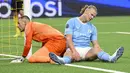 Hasil tersebut membuat Man City nyaman di puncak klasemen sementara dengan raihan sembilan poin. (Anthony Anex/Keystone via AP)