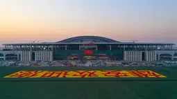 Foto dari udara menunjukkan lokasi konstruksi Stasiun Kereta Xiongan di Kawasan Baru Xiongan di Provinsi Hebei, China utara (20/12/2020). Stasiun kereta cepat Xiongan ini menampilkan desain arsitektur modern. (Xinhua)