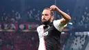 Pemain Juventus Gonzalo Higuain melakukan selebrasi usai mencetak gol ke gawang Bayer Leverkusen pada matchday kedua Liga Champions di Allianz Stadium, Turin, Italia, Selasa (1/10/2019). Juventus menghajar Bayer Leverkusen 3-0. (Alessandro Di Marco/ANSA via AP)