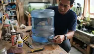 Cara Membuat Saluran Pembuangan Kotoran Ikan di Kolam Galon, Ikuti 7 Langkah Mudah Ini