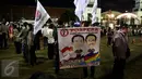 Ratusan Simpatisan tiga Bakal Calon Gubernur DKI Jakarta berkumpul mendukung para Bakal Calonnya mengambil nomer urut Pasangan Calon Gubernur dan Wakil Gubernur Jakarta, di JIEXPO, Kemayoran,, Jakarta, Selasa (25/10). (Liputan6.com/Johan Tallo)