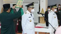 Pelantikan Penjabat Bupati Kampar dan Penjabat Wali Kota Pekanbaru oleh Gubernur Riau Syamsuar. (Liputan6.com/M Syukur)