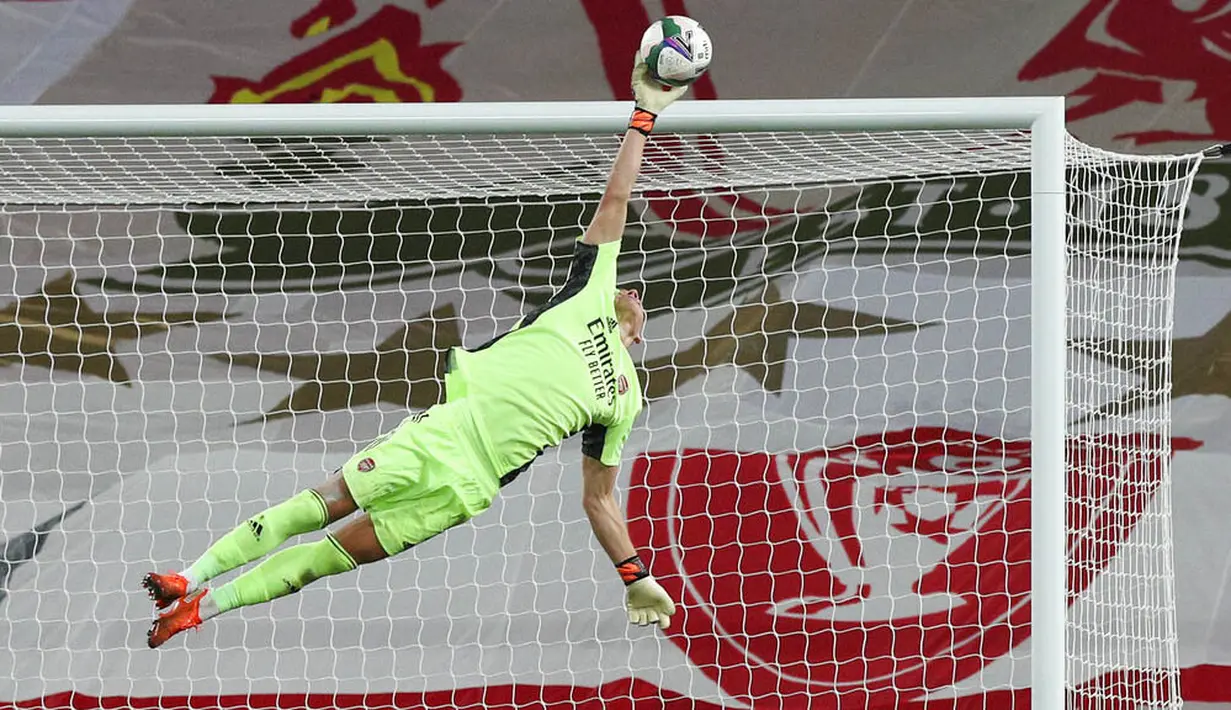 Total ada tujuh penyelamatan yang dibuat Leno untuk memaksa Liverpool lanjut ke babak adu penalti. (Peter Byrne/Pool via AP)