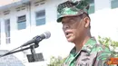 Citizen6, Surabaya: Wakil Komandan Kodikopsla Kolonel Laut (P) Sutrisno Sandi Asmara membacakab amanat Komandan Kodikopsla Laksma TNI Yayat Achmad Hadirat di lapangan Dewaruci Kesatrian Kodikopsla Ujung Surabaya, Senin (24/9).  (Pengirim: Penkobangdikal).