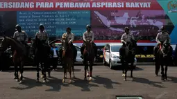 Para personel kepolisian itu disiagakan guna mengantisipasi adanya pendemo yang melakukan tindakan anarkis, Jakarta, (25/9/14). (Liputan6.com/Johan Tallo)