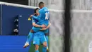 Pemain Zenit St. Petersburg Serdar Azmoun (kiri) melakukan selebrasi dengan Malcom usai mencetak gol ke gawang Chelsea pada pertandingan sepak bola Grup H Liga Champions di Gazprom Arena, St.Petersburg, Rusia, 8 Desember 2021. Pertandingan berakhir dengan skor 3-3. (AP Photo/Dmitry Lovetsky)