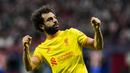 Pemain Liverpool Mohamed Salah melakukan selebrasi usai mencetak gol penalti ke gawang Atletico Madrid pada pertandingan sepak bola Grup B Liga Champions di Stadion Wanda Metropolitano, Madrid, Spanyol, Selasa (19/10/2021). Liverpool menang 3-2. (AP Photo/Manu Fernandez)